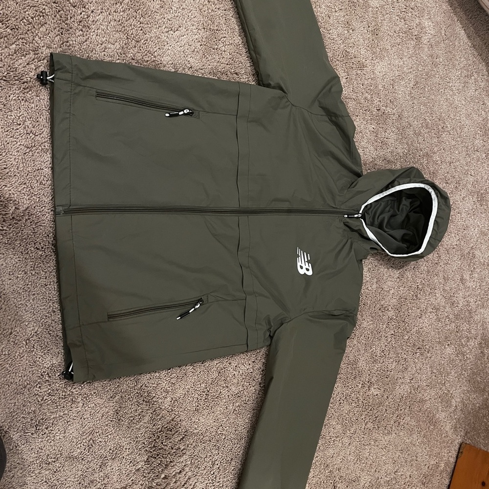 New balance rain coat color:green size: small